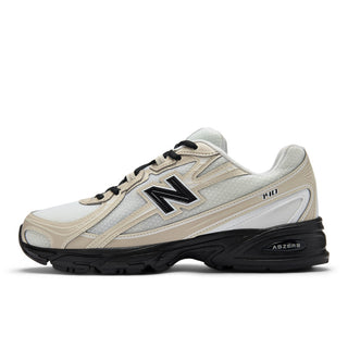 New Balance 740 sneakers in Timberwolf and White colorway with mesh and leather-look construction and ABZORB technology