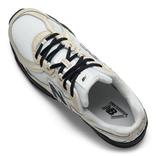 New Balance 740 sneakers in Timberwolf and White colorway with mesh and leather-look construction and ABZORB technology