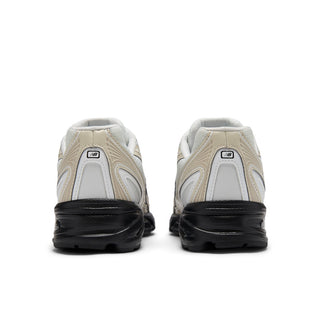 New Balance 740 sneakers in Timberwolf and White colorway with mesh and leather-look construction and ABZORB technology