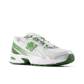 New Balance 740 in White/Alpine Green with mesh upper, ABZORB cushioning, and reflective accents.