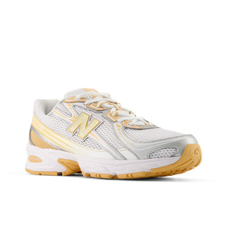 New Balance 740 in white/indoor court with mesh upper, ABZORB cushioning, and reflective detailing.