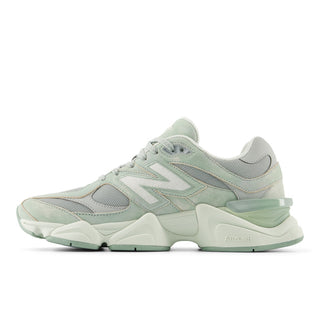 New Balance 9060 sneakers in green and sea salt colorway with mesh upper, pigskin suede overlays, dual-density ABZORB cushioning, and 990-inspired design