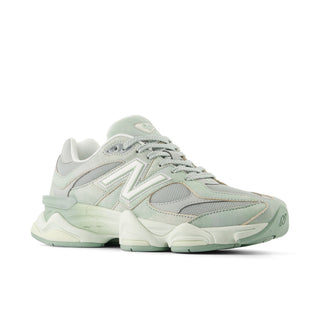 New Balance 9060 sneakers in green and sea salt colorway with mesh upper, pigskin suede overlays, dual-density ABZORB cushioning, and 990-inspired design