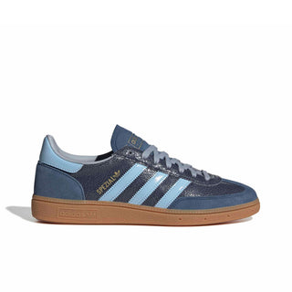 adidas Originals Handball Spezial in Night Indigo/Clear Sky — cracked leather quarter with suede overlays, patent leather stripes, and soft gum rubber outsole rooted in the original 1979 design.

