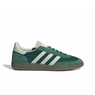 adidas Originals Handball Spezial in Collegiate Green/Linen Green — textile and mesh upper with suede overlays, snakeskin pattern detail, OG Spezial branding, and rubber outsole rooted in the 1979 heritage.