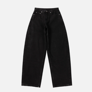 Front view of Dime Women’s Baggy Denim Pants in Black with wide legs, curved front pockets, a coin pocket, and belt loops