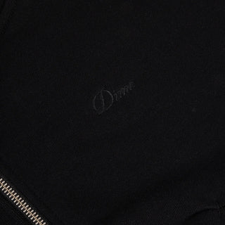 Model wearing the Dime Cropped Zip Hoodie in Black with a silver-tone front zipper, dropped shoulders, and ribbed cuffs