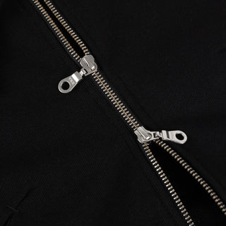 Model wearing the Dime Cropped Zip Hoodie in Black with a silver-tone front zipper, dropped shoulders, and ribbed cuffs