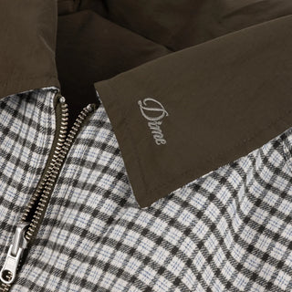 Front view of Dime Reversible Bomber Jacket in Olive with a contrasting plaid collar, full-length zipper, raglan sleeves, and gathered cuffs and hem