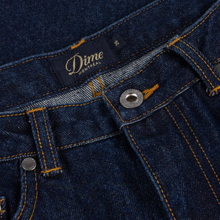 Dime Women’s Baggy Denim Pants in Indigo with curved front pockets and a relaxed baggy silhouette