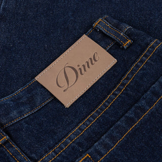 Dime Women’s Baggy Denim Pants in Indigo with curved front pockets and a relaxed baggy silhouette