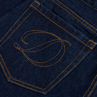 Dime Women’s Baggy Denim Pants in Indigo with curved front pockets and a relaxed baggy silhouette