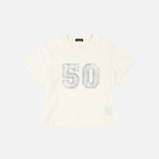 Front view of Dime Women’s Team Tee in Off-White with a large pale number 50 graphic across the chest and a small label near the hem