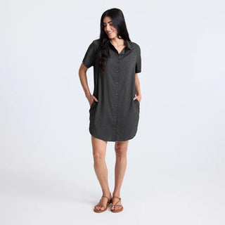 Roark Women's Bless Up Dress in Black, relaxed fit technical perforated shirt dress in 68% nylon 32% polyester with moisture-wicking quick-dry fabric, rubberized buttons, magnetic pocket closure, and leopard printed lining