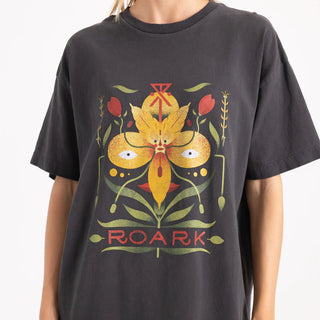 Roark Tomas Wildflower oversized black tee with distressed vintage-inspired graphic.