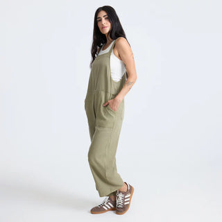 Roark Women's Costa Jumpsuit in Dusty Olive, relaxed fit lightweight woven jumpsuit in 60% organic cotton 40% Tencel with adjustable back straps, front and back patch pockets