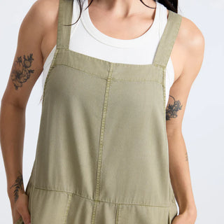 Roark Women's Costa Jumpsuit in Dusty Olive, relaxed fit lightweight woven jumpsuit in 60% organic cotton 40% Tencel with adjustable back straps, front and back patch pockets