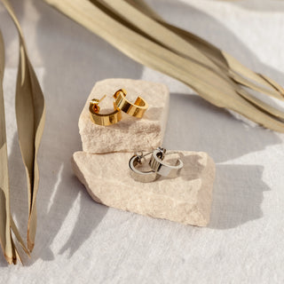 ALCO Sable hoops in 18K gold-plated stainless steel with push back hoop closure for classic everyday style.