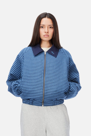 Front view of Dime Reversible Bomber Jacket in Navy with a blue plaid collar, full-length zipper, raglan sleeves, and gathered cuffs and hem