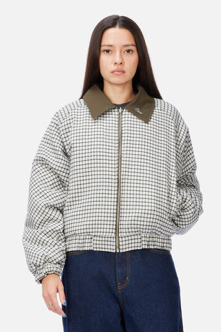 Front view of Dime Reversible Bomber Jacket in Olive with a contrasting plaid collar, full-length zipper, raglan sleeves, and gathered cuffs and hem