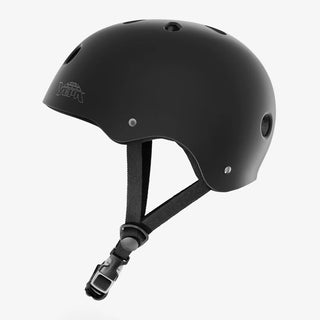 Matte black YEPA T-Shell skate helmet with stone grey outlined logo, black straps, and low-profile fit.