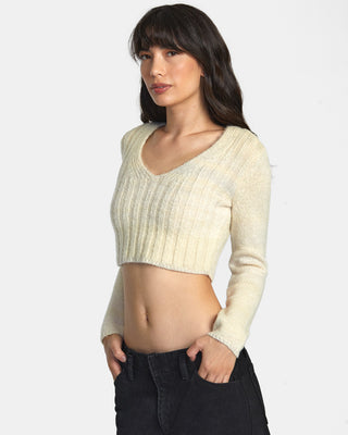 Woman in RVCA Destiny Sweater, recycled fabric, rib detail