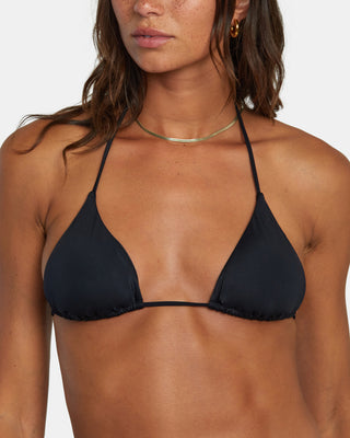 A black triangle bikini top with halter neck tie and RVCA logo on the back.