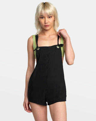 RVCA Women's black coverup romper with on-seam and back patch pockets.
