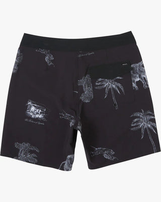 Black and white RVCA VA Pigment Boardshorts 18" with stretch material and brand detailing.