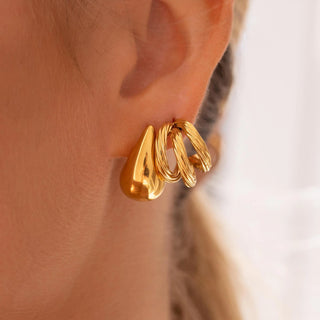 ALCO Cabo earrings in 18K gold-plated stainless steel with push back closure, hypoallergenic and water-resistant for everyday wear.