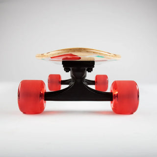 “Sector 9 Bambino Shorebreak complete skateboard with turquoise wave and lifeguard tower artwork, red wheels, black trucks, and a natural bamboo top.”