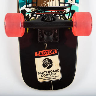 “Sector 9 Bambino Shorebreak complete skateboard with turquoise wave and lifeguard tower artwork, red wheels, black trucks, and a natural bamboo top.”