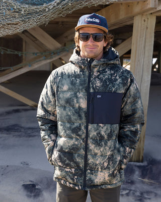 Salty Crew Barrier Insulated Jacket Camo with water-resistant ripstop fabric, insulated hood, and lightweight, packable cold-weather design.