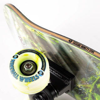 “Sector 9 Cascade Ninety Five complete skateboard showing mossy forest stream photography, woodgrain detailing, green-and-white wheels, and black grip tape.”