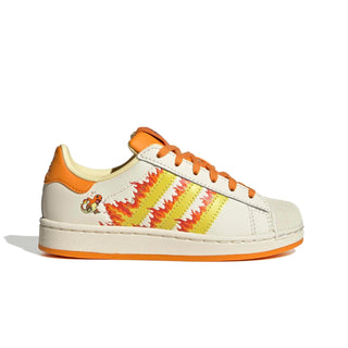 adidas Originals Pokémon Superstar II "Charmander" Kid's Shoes in Cream White/Shock Yellow/Bright Orange — Charmander tongue label and lateral side deboss, flaming 3-Stripes, coated leather upper with shelltoe, rubber outsole