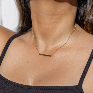 ALCO Jewelry Elegant 18K gold-plated Harmony Bar Necklace in stainless steel, hypoallergenic, with extender.