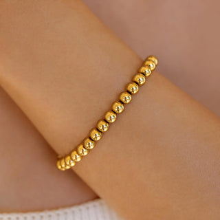 ALCO Seaside Stretch bracelet in 18K gold-plated stainless steel with comfortable stretch design for effortless coastal style.