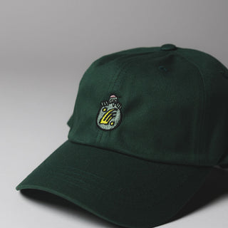 Green Drift House 6-panel strapback hat with "Woody" embroidered logo