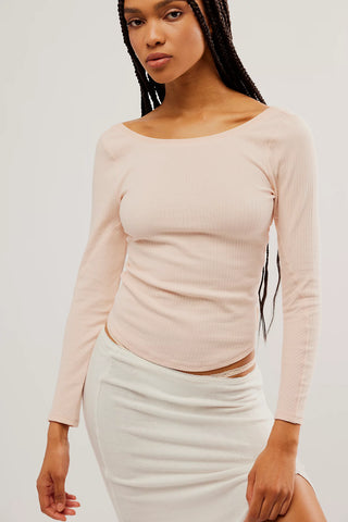Free People Fallen Rose Long Run Layering Top, slim-fit, soft stretch fabric, scoop neck, low-cut back.