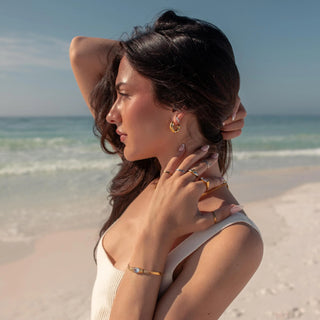 ALCO Sophie hoops in 18K gold-plated stainless steel with cubic zirconia stones and push back closure for elegance.