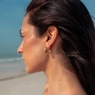 ALCO Sophie hoops in 18K gold-plated stainless steel with cubic zirconia stones and push back closure for elegance.