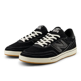 New Balance Numeric 440 V2 skate shoes in Black and Sea Salt with reinforced suede, synthetic, and mesh upper, ABZORB midsole for impact absorption, NDurance rubber outsole, and durable rubber cupsole