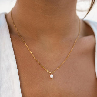 ALCO Isla necklace in 18K gold-plated stainless steel with freshwater pearl, lobster clasp, and 16 inch chain.