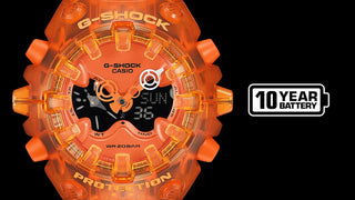 G-SHOCK GAV01SKE-4A Analog-Digital Watch in translucent Orange — Y2K-inspired design with integrated bezel, Shock Release Hand magnetic minute hand, full-screen LCD, metallic openwork dial, and 10-year battery life.