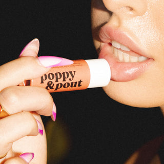 Poppy & Pout Pink Grapefruit Lip Balm, light and tart, natural hydration, eco-friendly, pink tube.