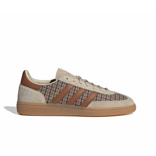 Close-up of adidas Originals Handball Spezial in Beige/Khaki Three/Dusky Bronze showing houndstooth fabric, brown stripes, gold Spezial branding, and a gum sole.