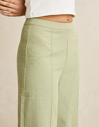 Rhythm Vista Stripe Wide Leg Pant in Olive, lightweight textured fabric with mid-rise waistband, relaxed wide leg silhouette, and subtle vertical stripe in a full-length cut