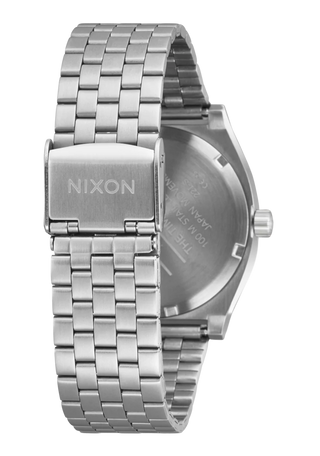 Nixon Time Teller Silver/Lavender analog watch with stainless steel bracelet and soft lavender dial.