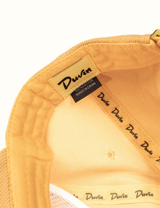 Yellow Duvin Script Corduroy Hat with unstructured design and shark bite side embroidery.