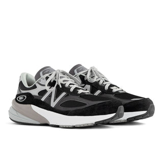 New Balance Made in USA 990v6 sneaker in black and white with pigskin suede, mesh overlays, and FuelCell cushioning.